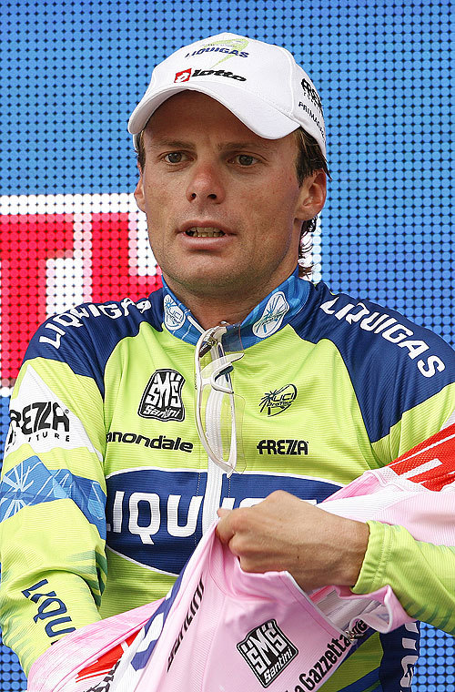 Di Luca pulls on pink jersey Di Luca pulls on pink jersey