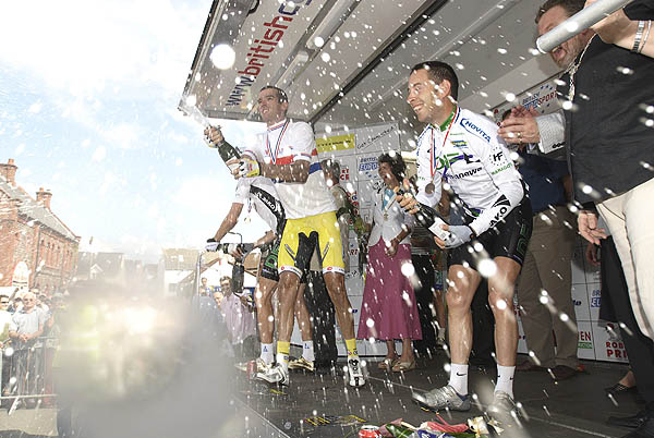 David Millar sprays the champagne