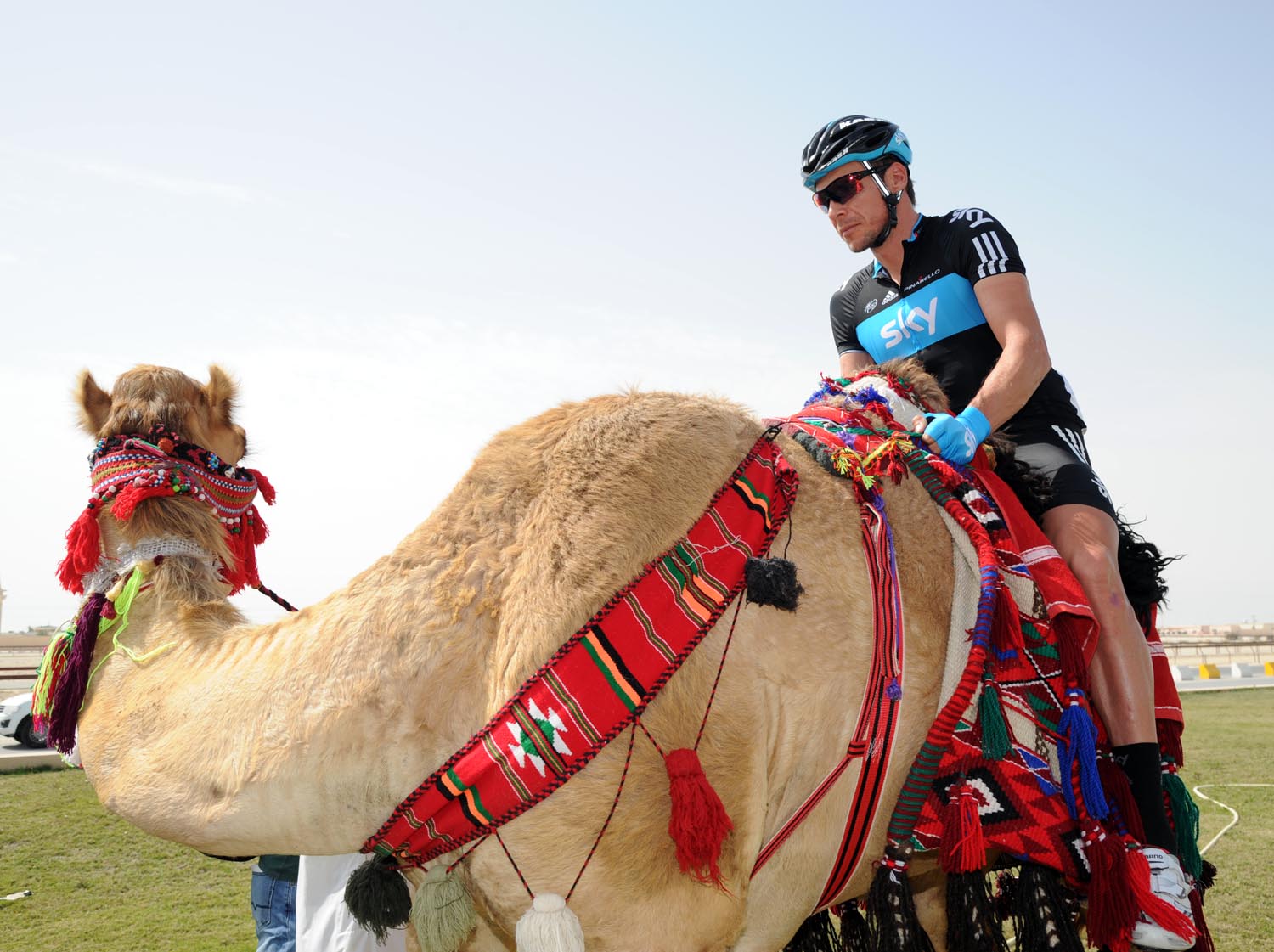 Jeremy Hunt and camel, Tour of Qatar 2011, stage two