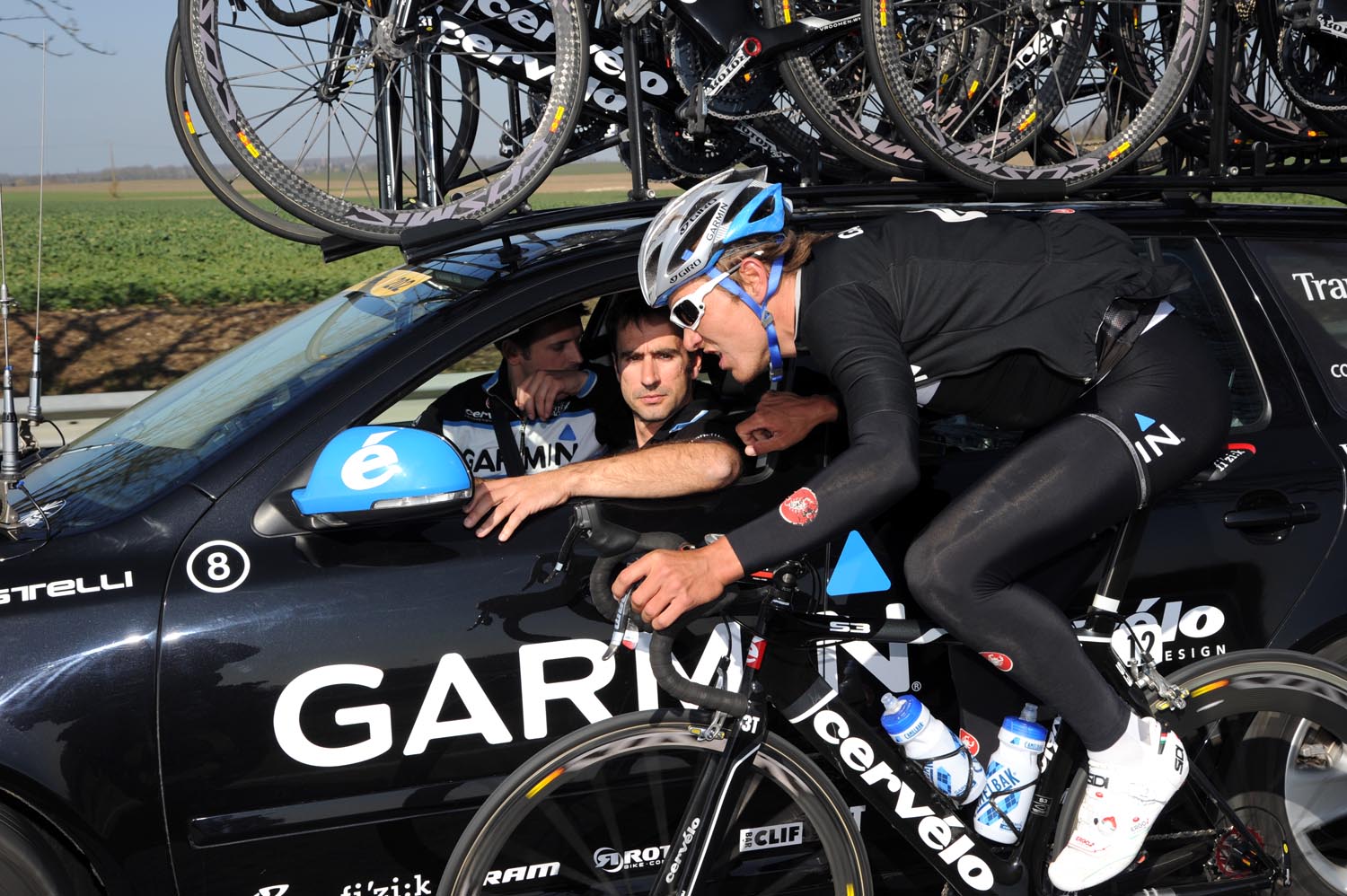 Heinrich Haussler at the team car, Paris-Nice 2011, stage one