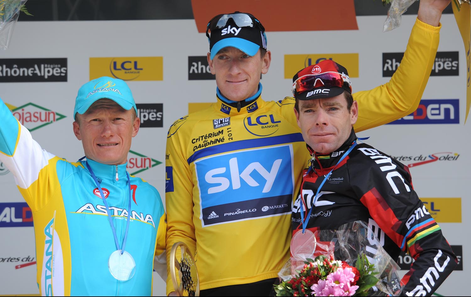 Bradley Wiggins top podium, with Alexandre Vinokourov (third) and Cadel Evans (second), Criterium du Dauphine 2011, stage seven Bradley Wiggins top podium, with Alexandre Vinokourov (third) and Cadel Evans (second), Criterium du Dauphine 2011, stage seven