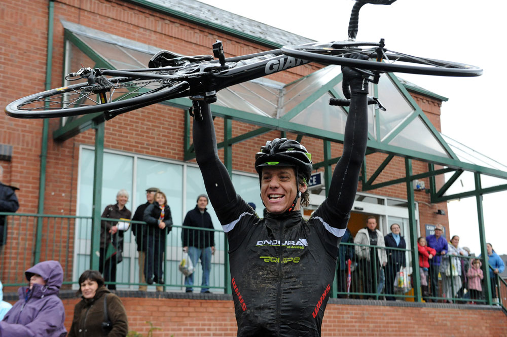 cicle12-Blain-hoists-bike.jpg Alexandre Blain hoists bike after win, Rutland-Melton International CiCLE Classic 2012