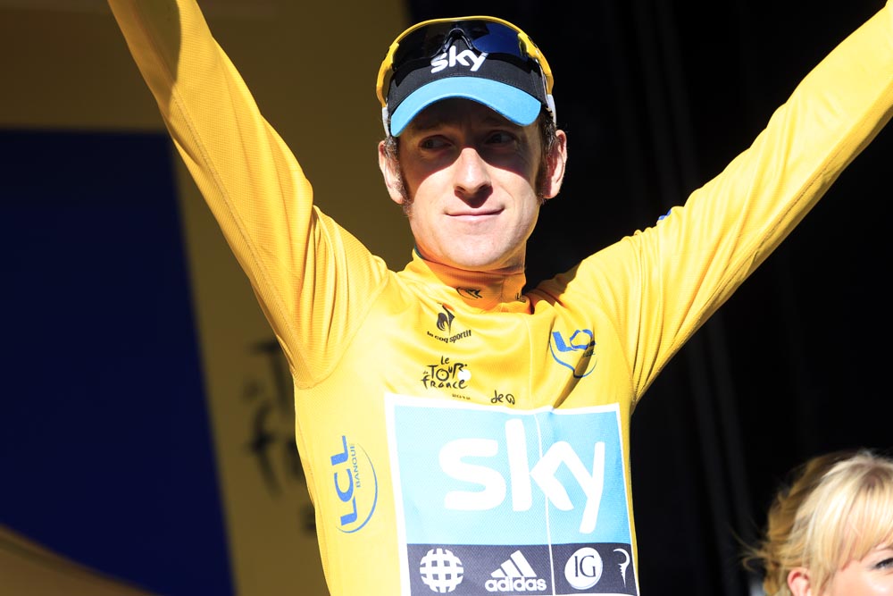 Bradley Wiggins on podium, Tour de France 2012, stage 11