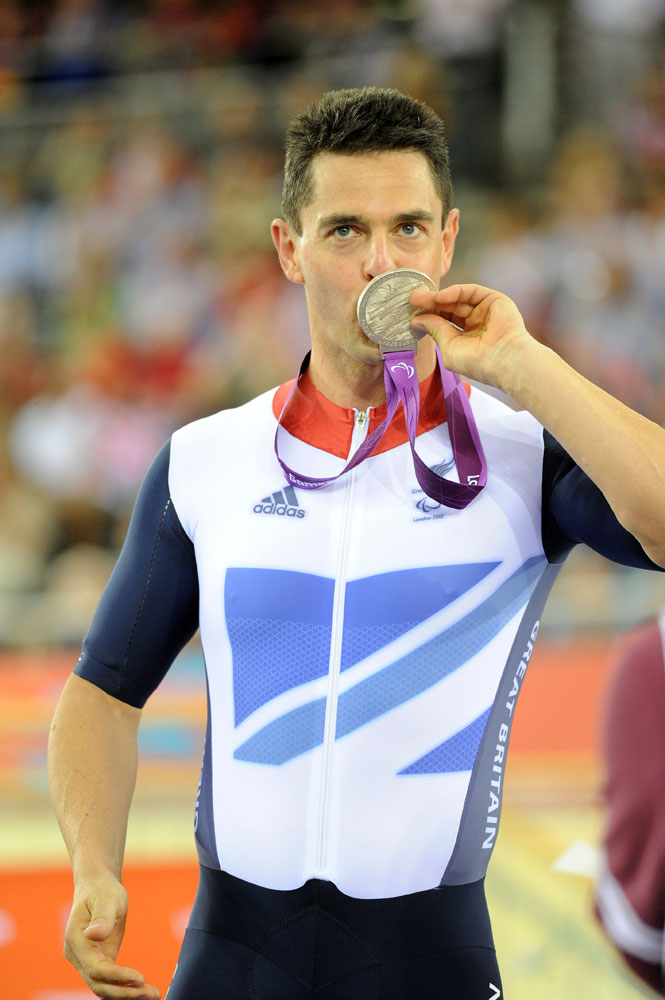 para12-track-day1pm-Colbourne-medal.jpg Mark Colbourne takes silver in 1km time trial, London 2012 Paralympic Games, track day one afternoon