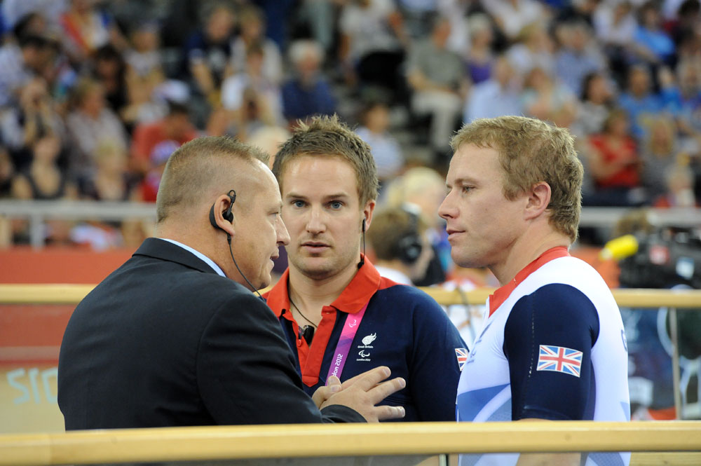 para12-track3-am-MacLean-asks-judges.jpg Craig MacLean talks to judges, London 2012 Paralympic Games, track cycling day three, morning