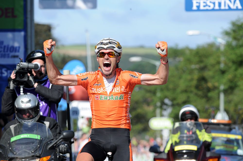 Samuel Sanchez celebrates Pablo Urtasun's win, Tour of Britain 2012, stage seven