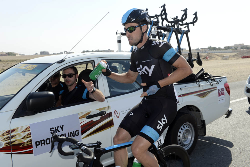 Bernhard Eisel at the team car, Tour of Qatar 2013, stage 3