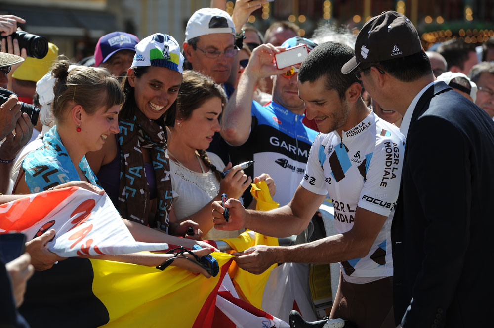 tdf13-st7-aj-Kadri-autographs-2.jpg Blel Kadri signs autographs, Tour de France 2013, stage seven