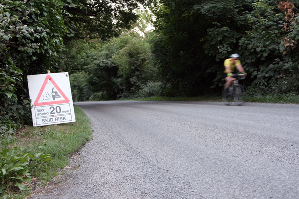 Surface dressing on Headley Common Road, Surrey Surface dressing on Headley Common Road, Surrey
