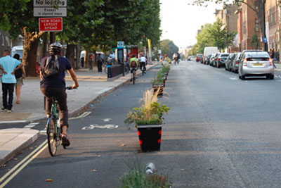 Camden cycle path, planters and armadillos Camden cycle path, planters and armadillos